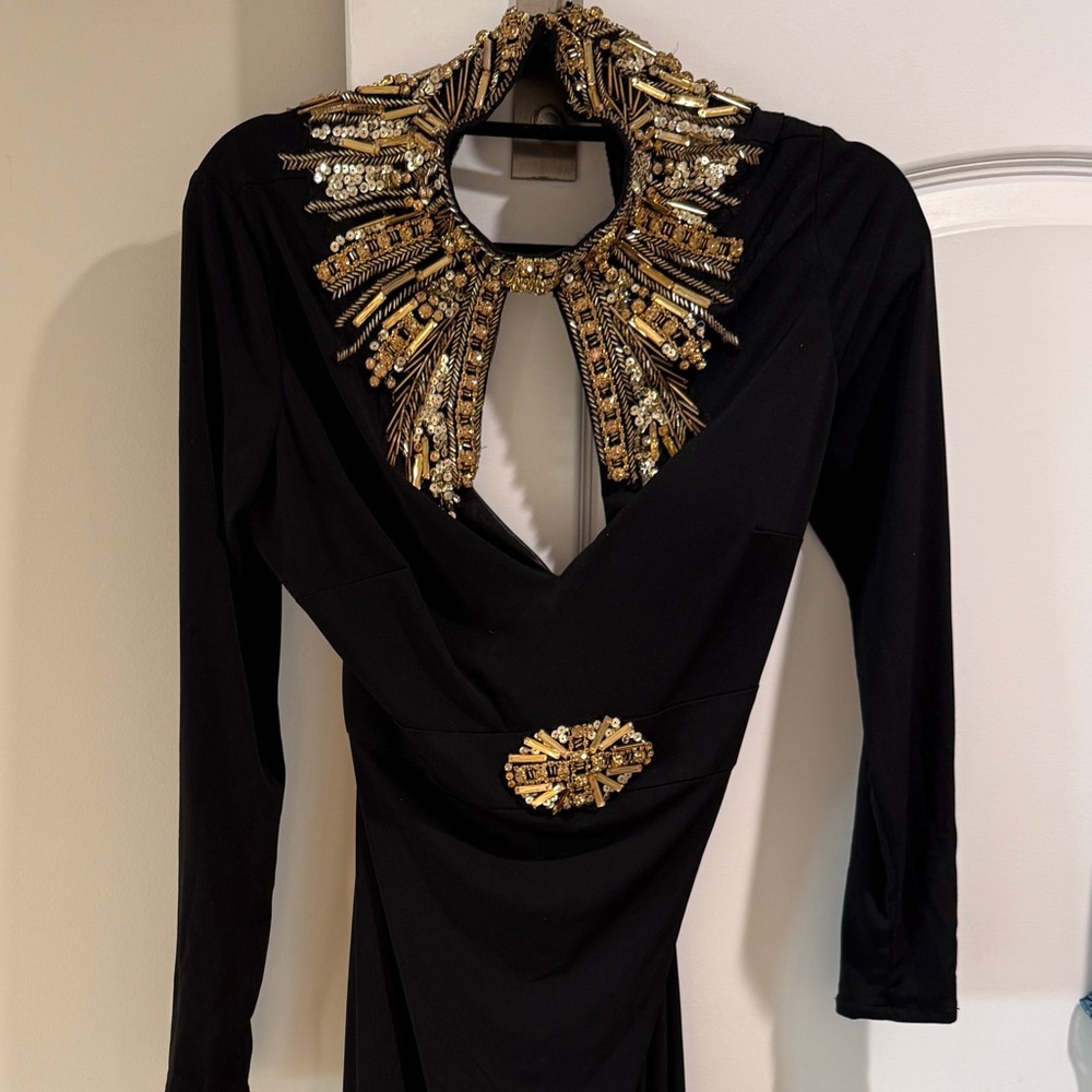 Elegant Black Dress with Gold Embellishments